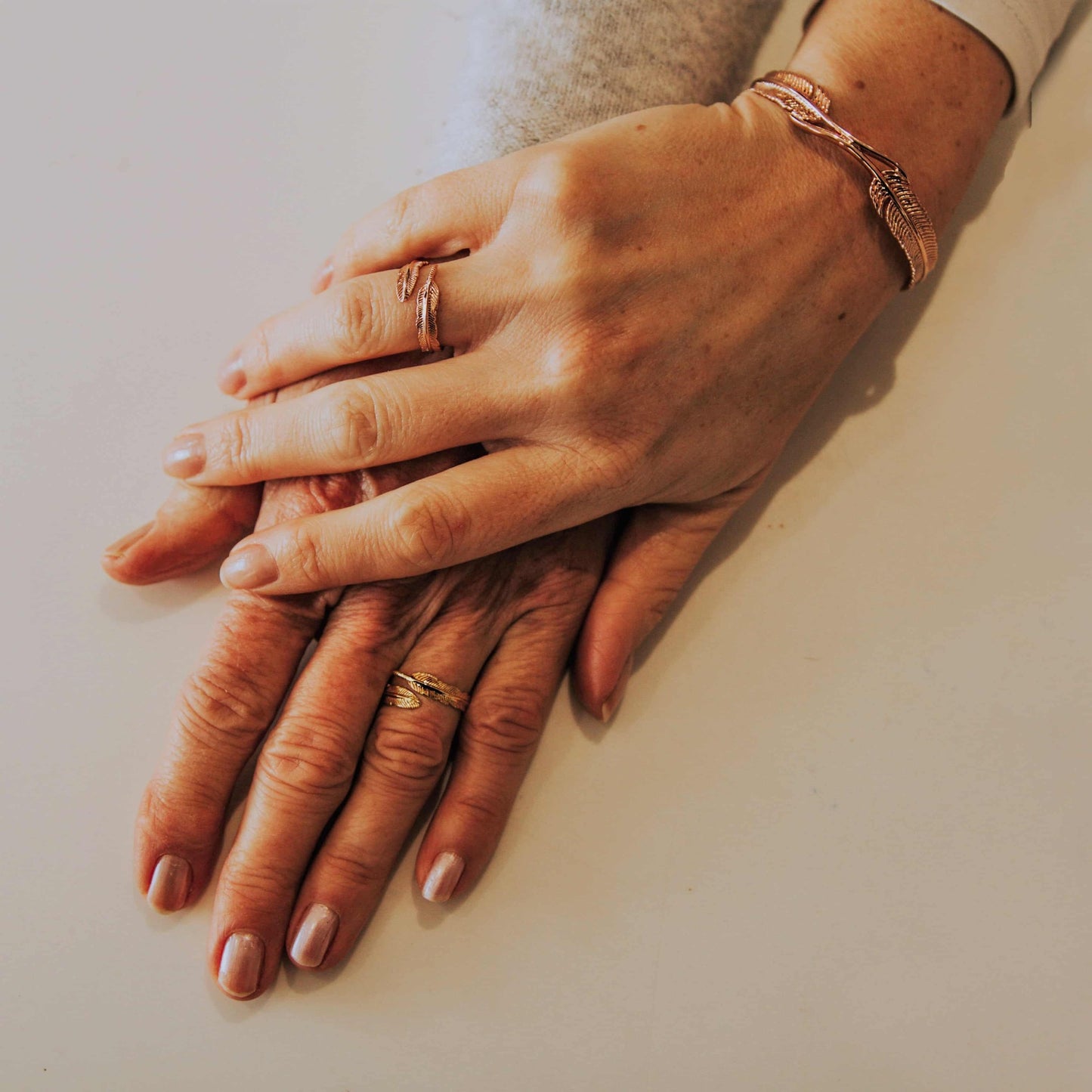 ADJUSTABLE PLUME RING