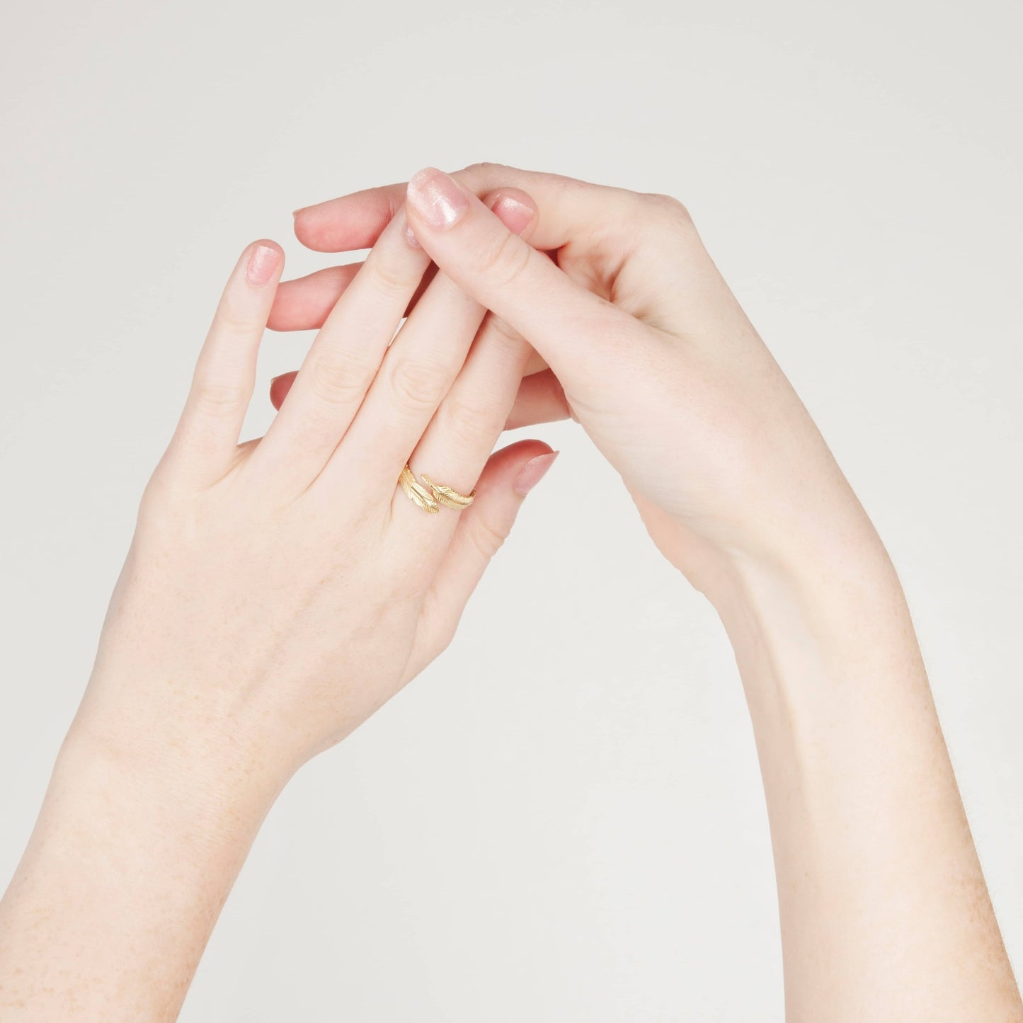 ADJUSTABLE PLUME RING